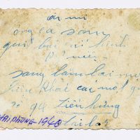 Words on the back, with the date 1940 and the place of Haiphong