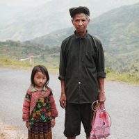 Father and daughter on the road