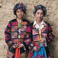 Portrait of two girls from the Lo Lo ethnic group